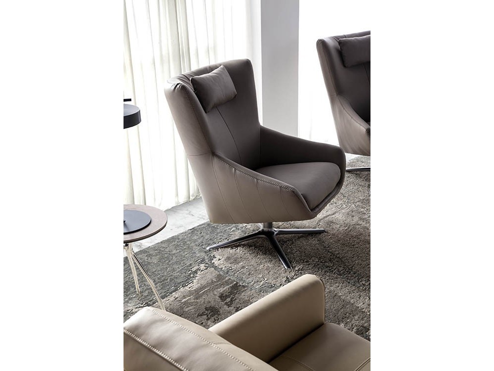 Sillón giratorio con pie de acero y asiento tapizado en piel sintética 5044 de Ángel Cerdá en Mobel 6000
