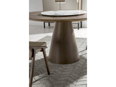 Mesa de comedor redonda de madera chapa nogal con centro giratorio porcelánico 1016 de Ángel Cerdá