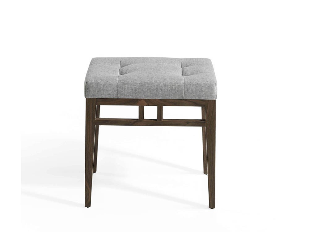 Taburete acolchado con estructura de madera chapa nogal tapizada en textil 5027 de Ángel Cerdá