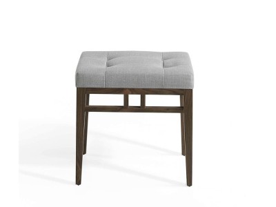 Taburete acolchado con estructura de madera chapa nogal tapizada en textil 5027 de Ángel Cerdá
