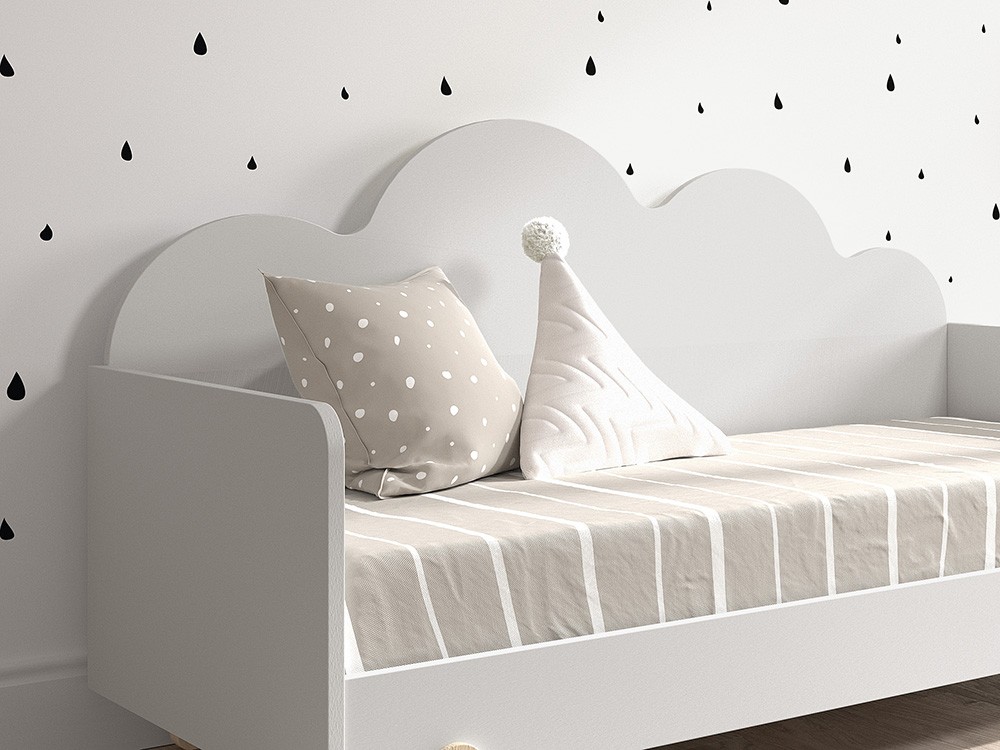 Cojín triangular zig-zag con pompón blanco