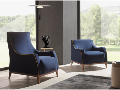 Versión con respaldo alto de la butaca Diab. Diseño elegante y envolvente para mayor confort.