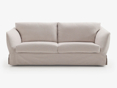 Spat es un sofá cama de líneas puras y carácter vintage, con un diseño que parece esculpido en un solo gesto.